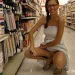 Touching her pussy with some tool at the store