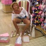 Pantyless cougar at the shoe store
