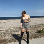 Black leather boots seaside