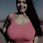 smiling teen huge natural tits flashing on beach