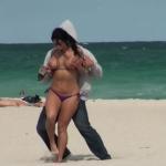 Exotic busty girl in purple bikini big tits sharking