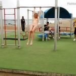 Naked blonde at public gym