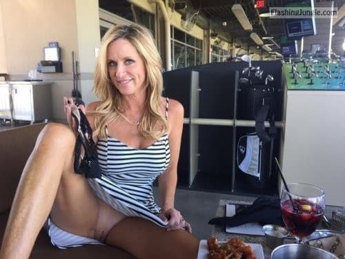 Very attractive blonde milf pantyless at restaurant upskirt pussy flash public flashing no panties milf pics howife