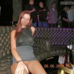 Pantyless redhead in night club separe
