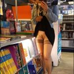 Pantyless at book store: stockings and hairy cunt