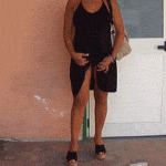 Shy girlfriend in black dress flashing pantyless