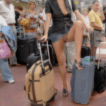 carelessinpublic:In a short skirt and showing her pussy in a…