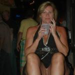 carelessinpublic:Milf in a short dress inside a bar and showing…