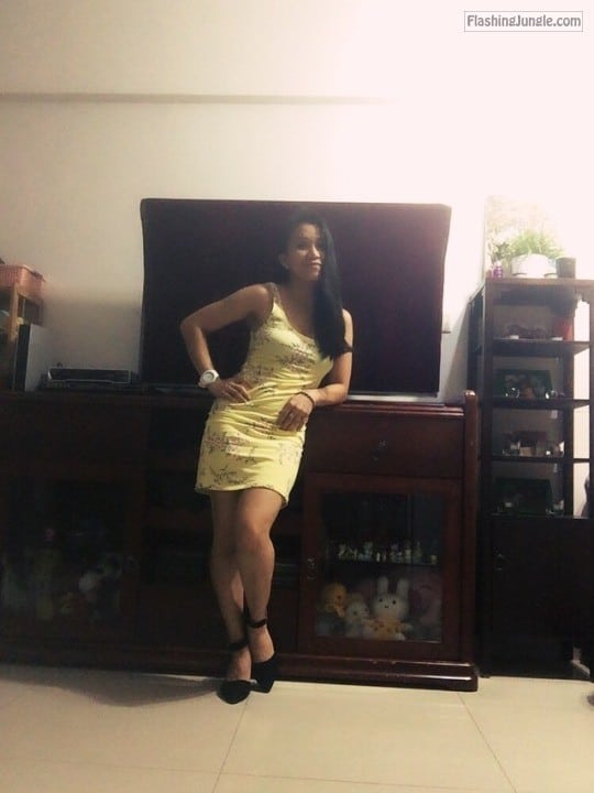 Hotwife Pics: Hot wifey shows off her killer body in yellow dress