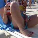 Horny amateur slut caught on the beach fixing her panties