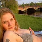 Stunning babe exposes her sexy hard nipple by the river