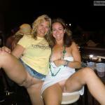 Drunk MILFs from Texas flash their coochies at the bar