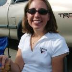 Smiling wife pokies while having breakfast