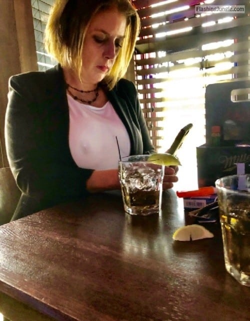 MILF Flashing Pics - Voyeur caught nipple under white blouse of sexy cougar in pub while texting