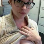 Secretary with nerdy glasses flashing Suckable nipples at work