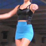 Pantieless girl in blue mini skirt doing some acrobatics on the street
