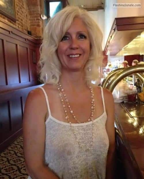 Public Flashing Pics - Mature blonde feeling sexy without bra under white tank top