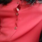 No bra under red blouse