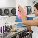 Watching the girl at the laundry fold her panties and bras.