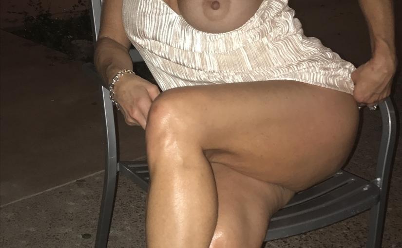 John’s sexy wife flashing boobs outdoors