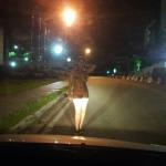 laura16 in front of car at night