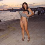 A mature slut goes for an evening walk.