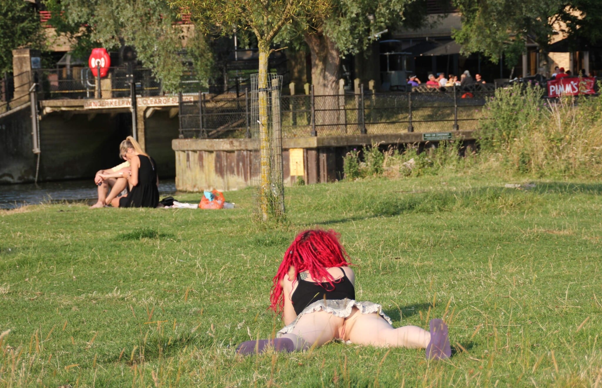 Laying knickerless in a public park easy access for horny strangers voyeur real nudity public flashing no panties
