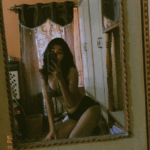 Hot brunette makes selfie in underwear