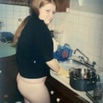 Girl is flashing ass in the kitchen