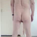 Nude guy’s ass on display