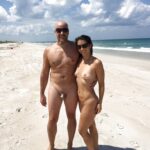 Naked couple at the beach