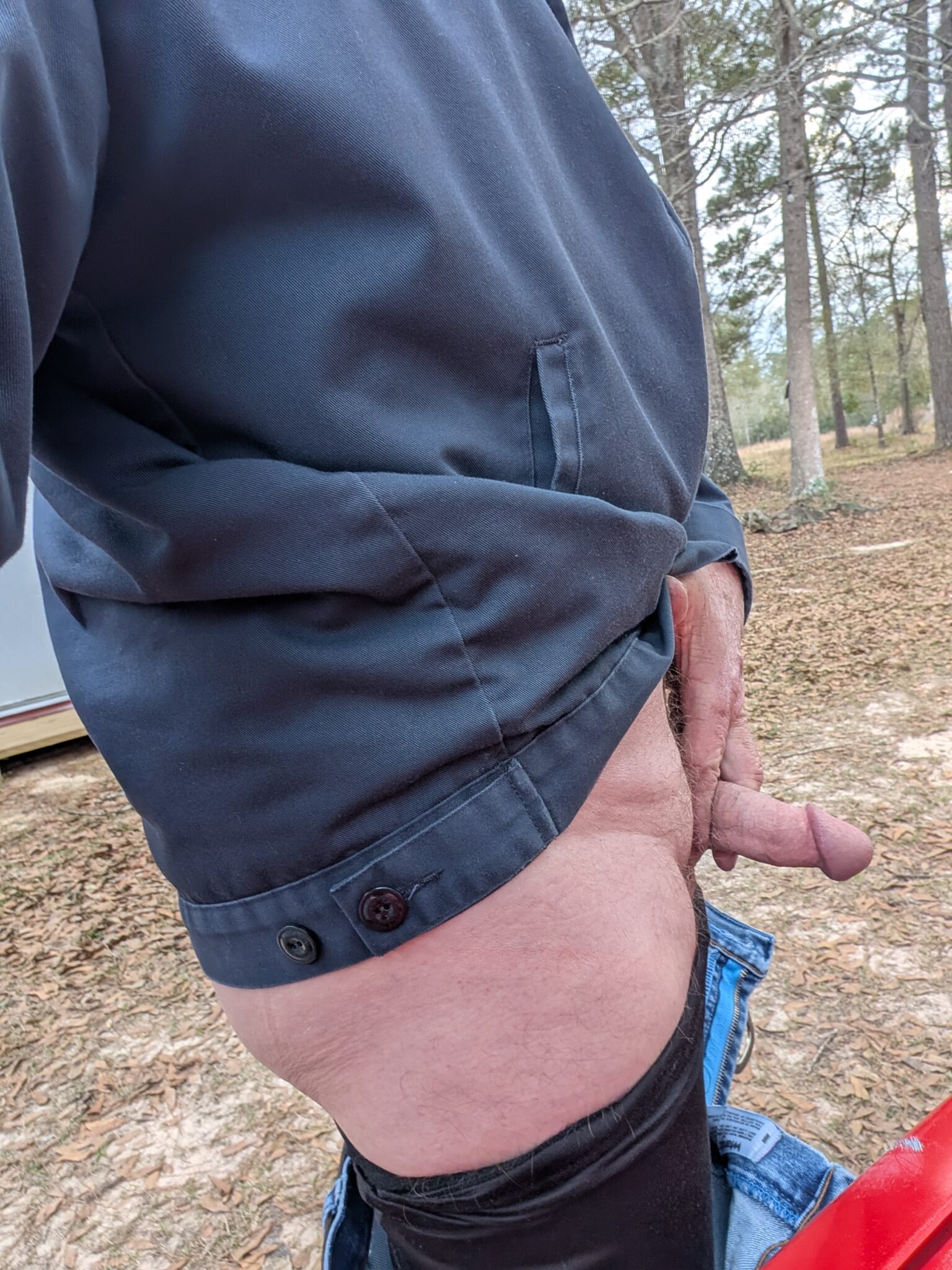 Ass Flash Pics: Outdoor Encounter: A Mature Flash in the Woods A mature individual exposes their midsection in a woodland setting, capturing a moment of vulnerability and power in nature.