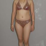 Why Did She Choose That Bikini for Her Bathroom Selfie?