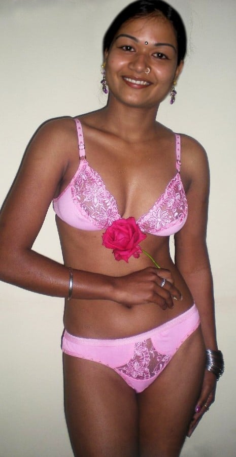 mrs joy porn - A Warm Welcome: Sister’s Lingerie Greeting Noopur, in pink lace lingerie, welcomes her brother with a red rose, embodying joy and anticipation in a plain indoor setting. - Bitch Flashing Pics