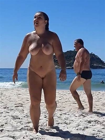 xxgasm nude beach pornstar pussy spreading - Sunny Beach Encounter: Nude Woman and Voyeuristic Man A nude woman stands confidently on a sunny beach, her laughter echoing as a man in briefs watches from behind, creating a charged atmosphere of voyeurism and... - Bitch Flashing Pics