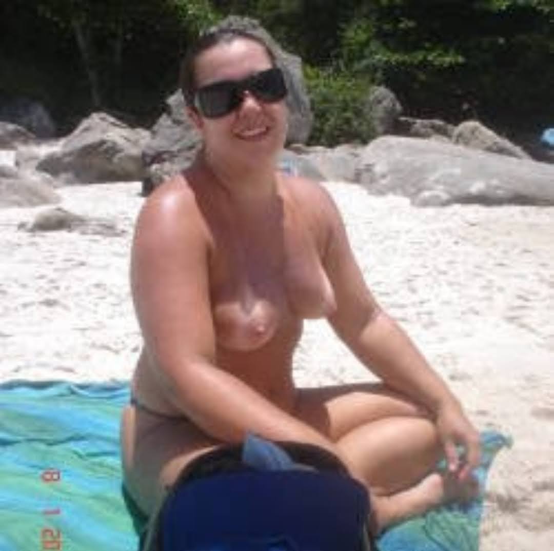image xxx lesbian blak big woman kampala - Sunny Beach Flash: Mature MILF Bared on Public Sand A mature MILF confidently flashes on a public beach, her bare torso and natural breasts captured in a frontal view, embodying bold public nudity. - Bitch Flashing Pics