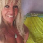 Midnight Bedroom Tease: Blonde Amateurs Flash Her Boobs