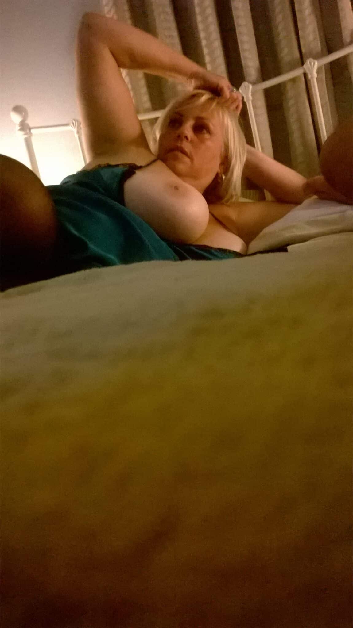 waptrick short big booty african xxx - Afternoon Delight: MILF Flashes Her Big Tits in Bed A MILF in a teal satin robe flashes her big tits in a bedroom setting, captured in a low-angle shot on a bed with a white metal headboard. Her pose sugg... - Boobs Flash Pics