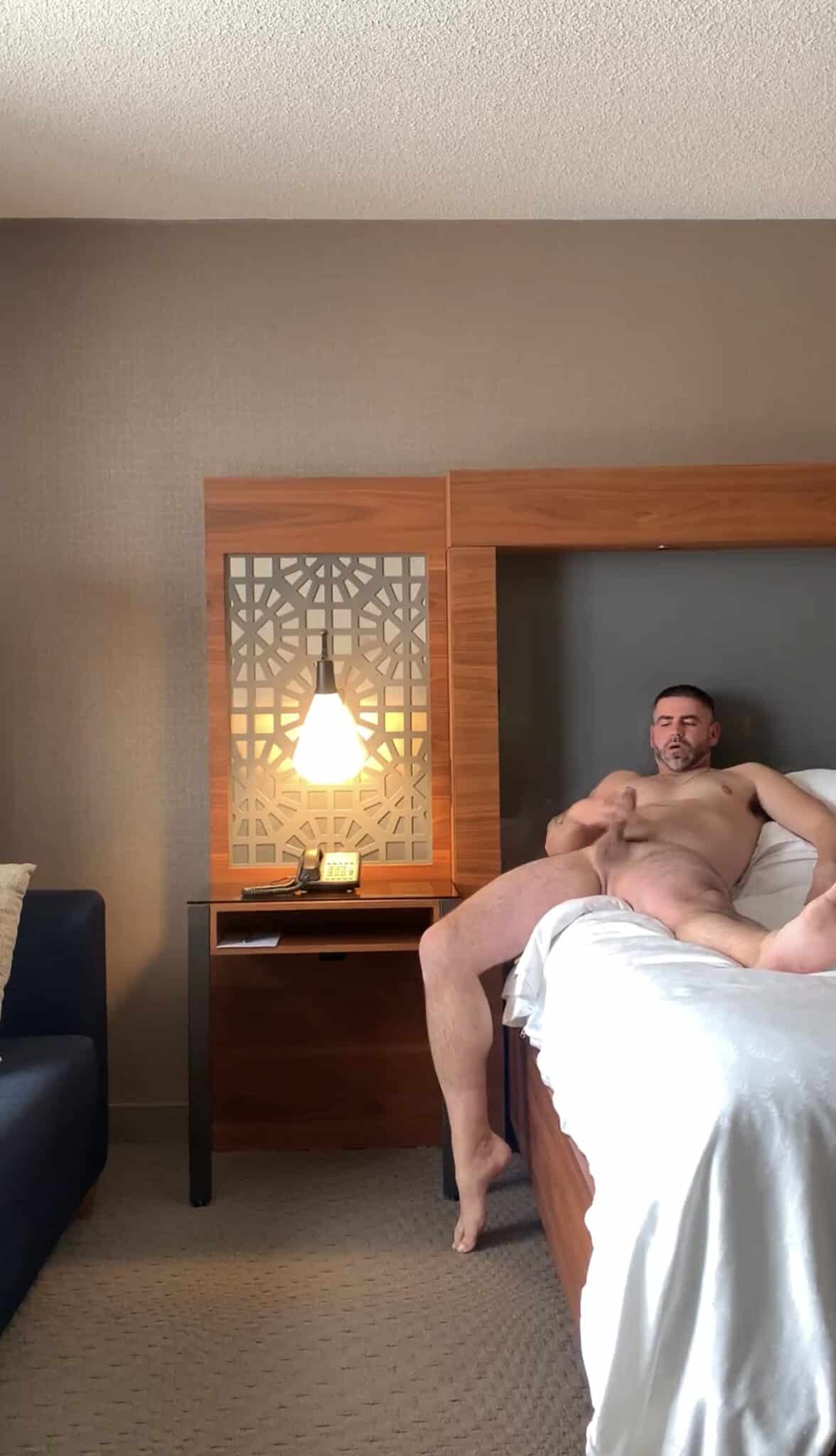 jb voyeur filedot - Bedroom Voyeur: Masturbating Alone A muscular man masturbates alone in a dimly lit bedroom, legs spread wide, lost in the moment. The scene captures a private, unfiltered glimpse of pleasure. - Dick Flash Pics