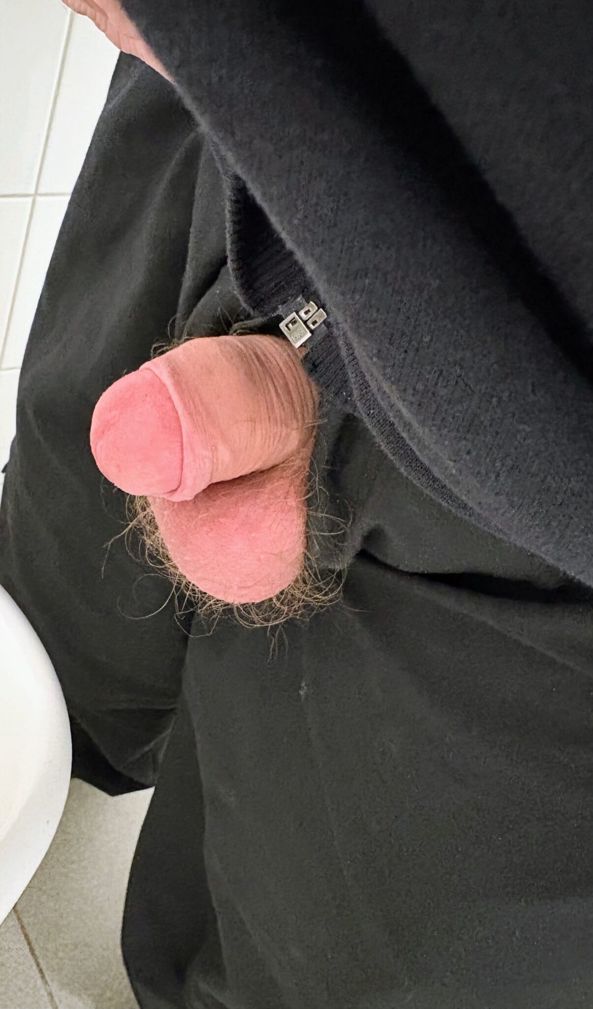 www african woman niked com - Restroom Encounter: Spontaneous Flash A man in a restroom leans forward, his dark pants and metal belt buckle catching the light. The camera angle highlights his hips, creating a sense of intimac... - Dick Flash Pics