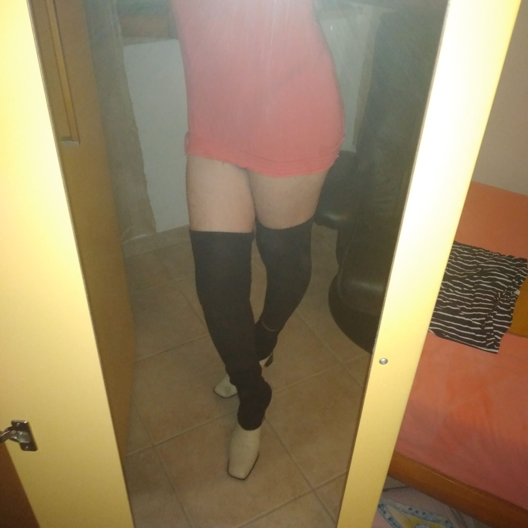 Ass Flash Pics: Is This Bathroom Encounter Just a Tease or Something More? A person stands in a bathroom, partially clothed, hinting at a private moment. The setting includes a shower stall and tiled walls, suggesting intimacy and s...