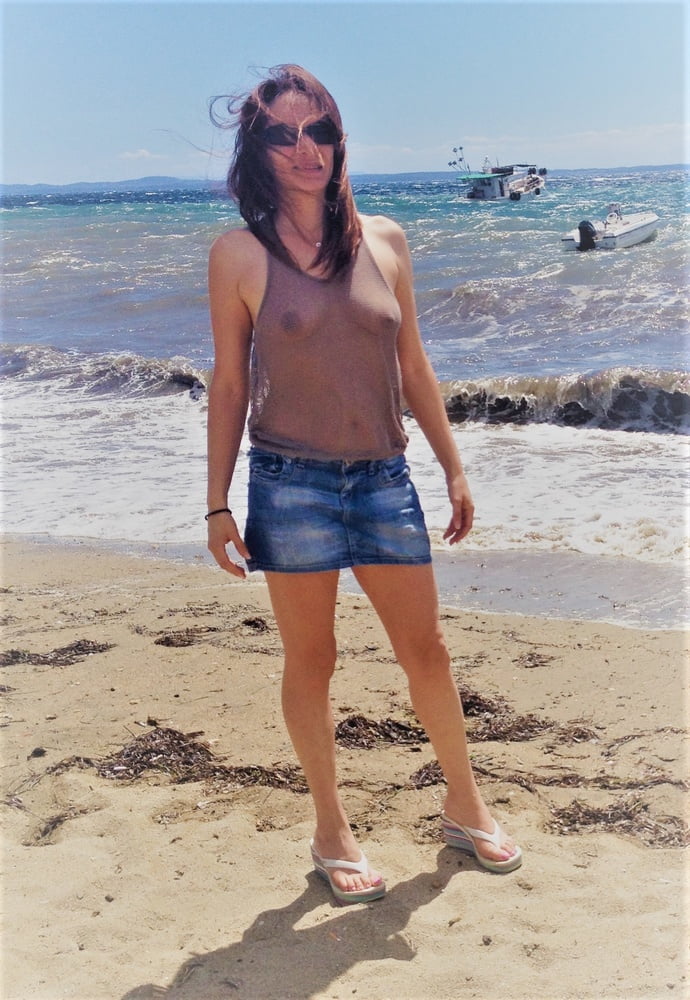 pics of pounding my mom in a car while sucking her breast at youx xxx - Sun-Kissed Exposure: Lola’s Beachside Tease Lola stands confidently on a sunny beach, wearing a sheer top and denim shorts, drawing attention with her bold, public display. - Bitch Flashing Pics