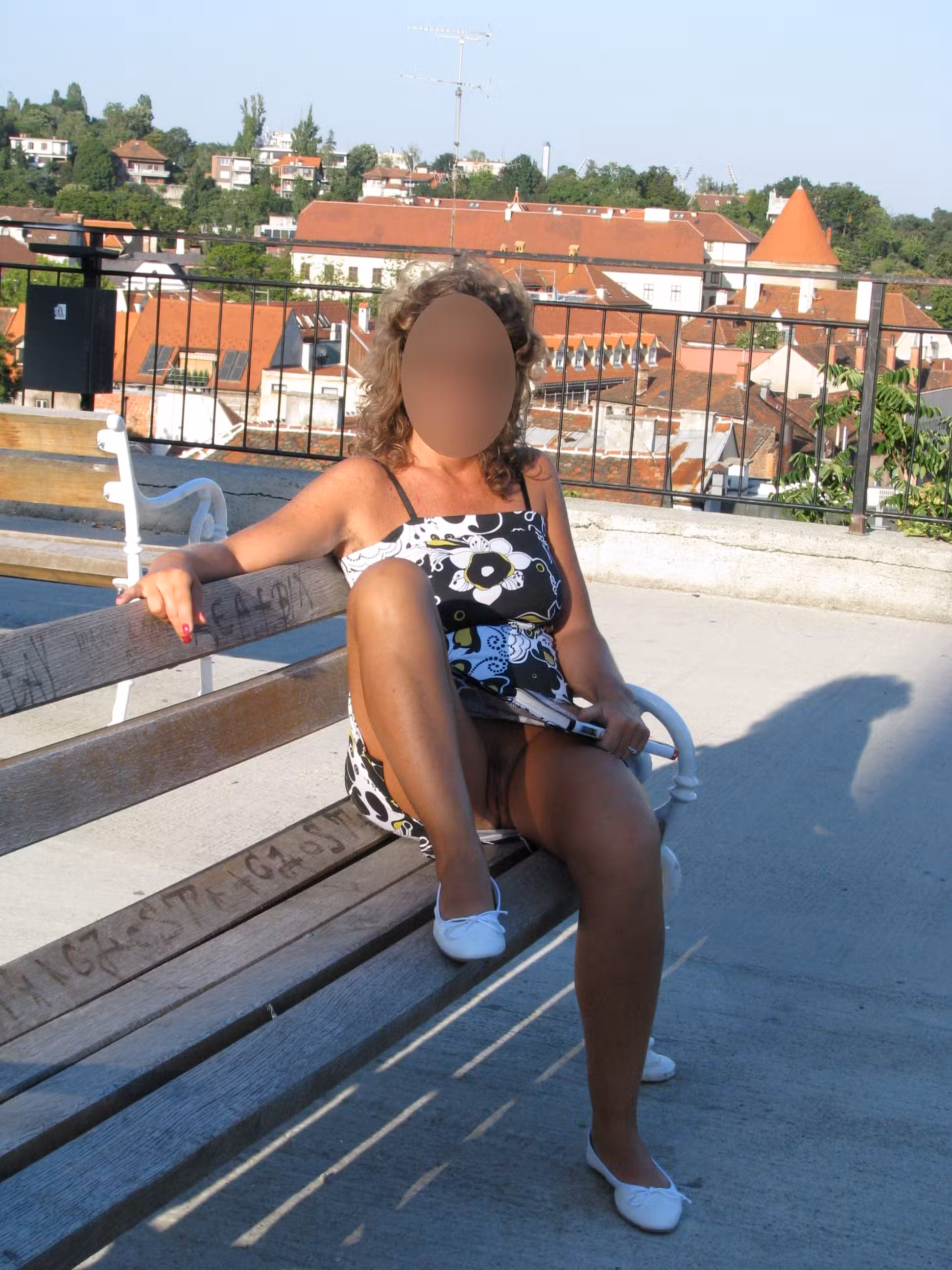 waptrick image mami water - Exposed on the Rooftop: A Bold Upskirt Display A woman sits on a rooftop bench, legs spread, exposing her pussy in a black-and-white swimsuit. The city view serves as a backdrop to her exhibitionist displ... - Bitch Flashing Pics