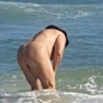 Why Is This Mature Woman Flashing Her Ass on the Beach?