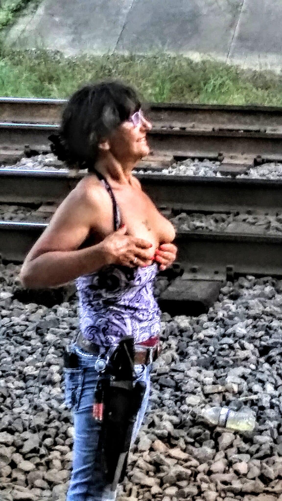 milf breasts - Mature MILF Flashing: Curvy Hotwife by Train Tracks A mature MILF flashes her breasts beside train tracks, wearing unbuttoned jeans and a pulled-up top, hands cupping her natural breasts. - Hotwife Pics