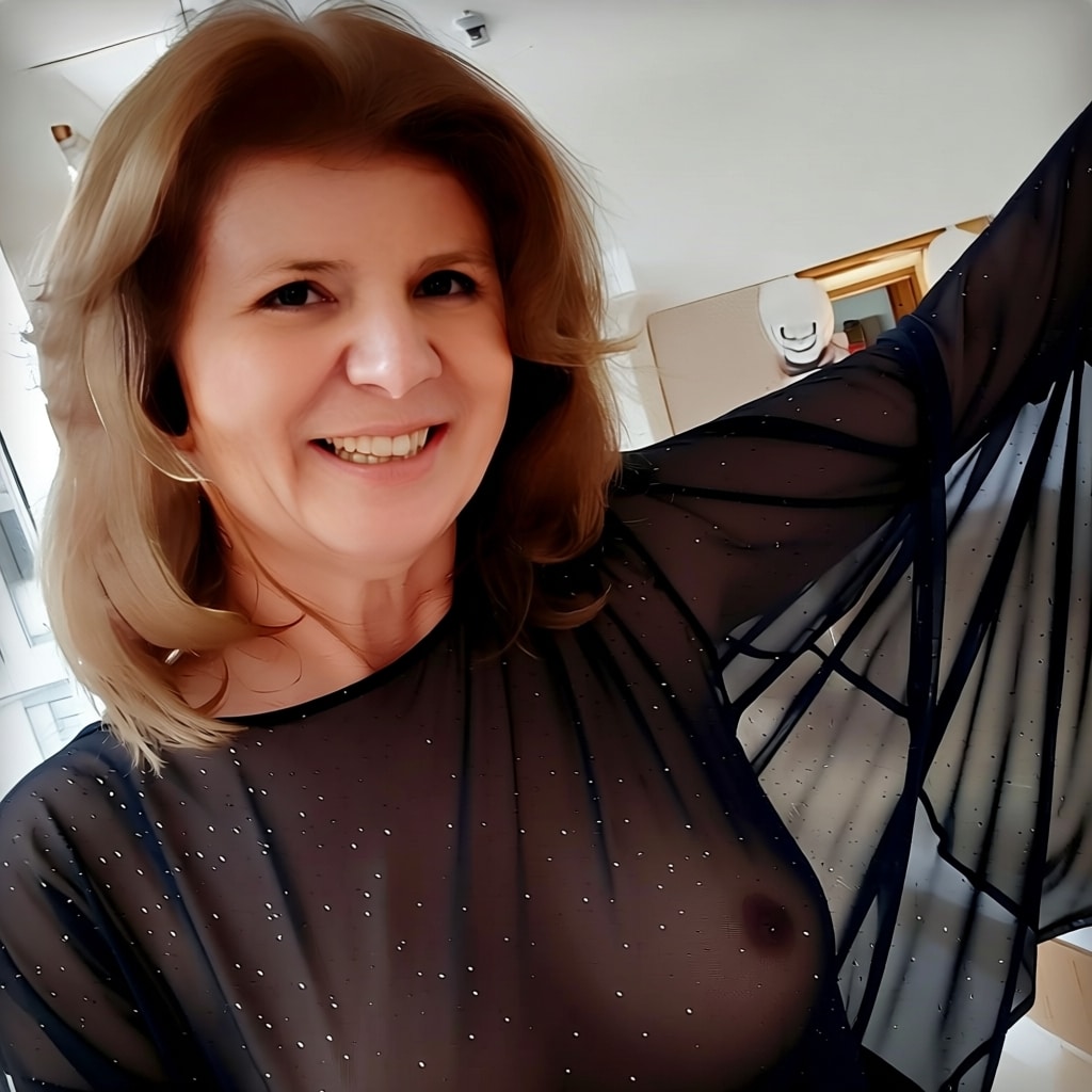 flash top jb - Curvy Blonde in Sheer Top: Bedroom Tease A mature blonde woman in a sheer black top poses confidently in a bedroom setting, nipples visible through the transparent fabric, offering a teasing glimpse... - Boobs Flash Pics