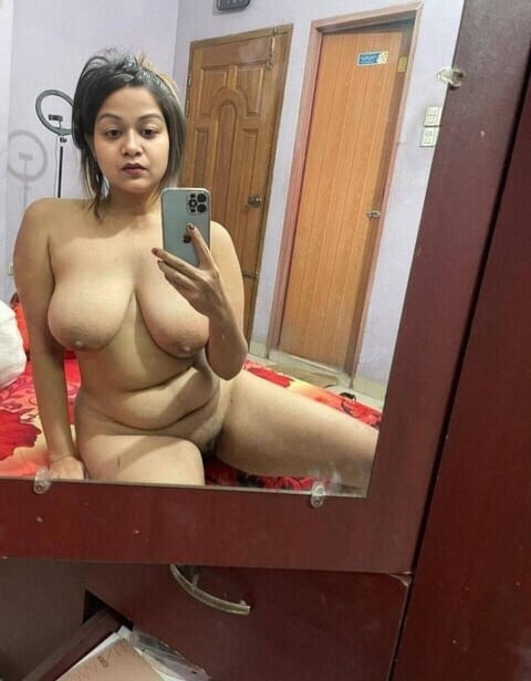 Bitch Flashing Pics: South Asian MILF Flashes Big Boobs and Trimmed Pussy South Asian MILF Noopur Dash flashes big boobs and trimmed pussy in a bedroom mirror selfie, showcasing her thick curves and confident nude pose.