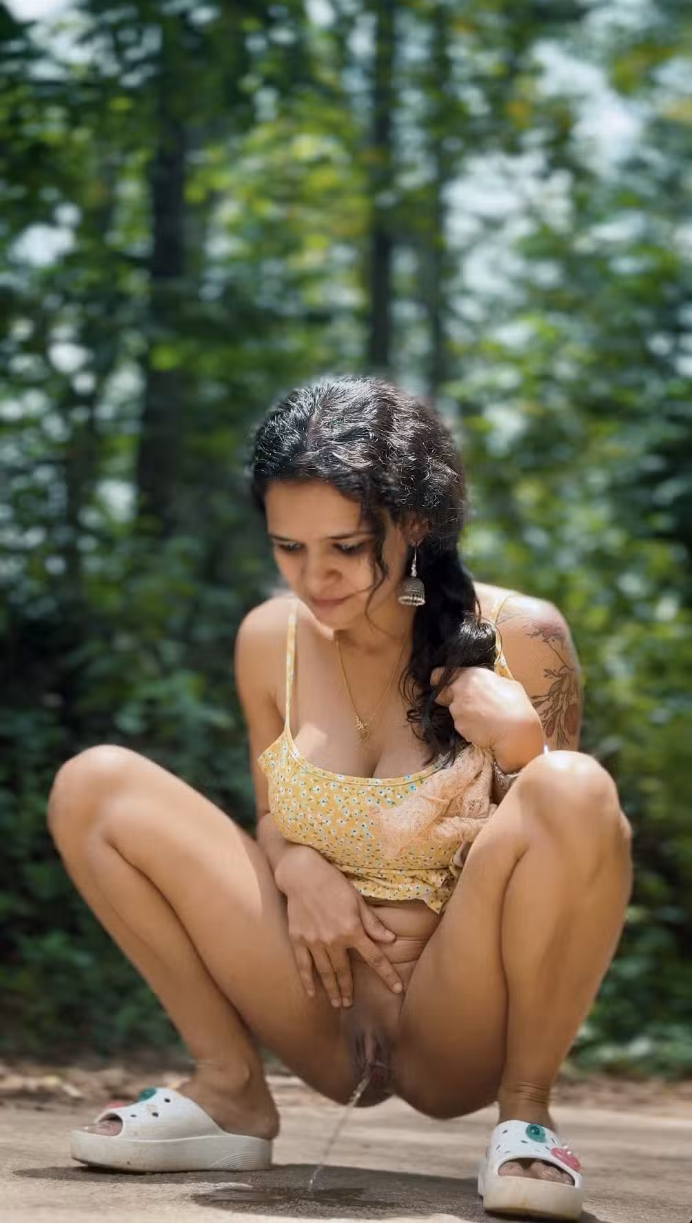 nigeria lesbians nude fotos - Squatting in the Woods: A Natural Flash A woman squats outdoors, partially nude, exposing her natural bush and urinating. Her confident pose and focused expression highlight her comfort in the wild... - Bitch Flashing Pics