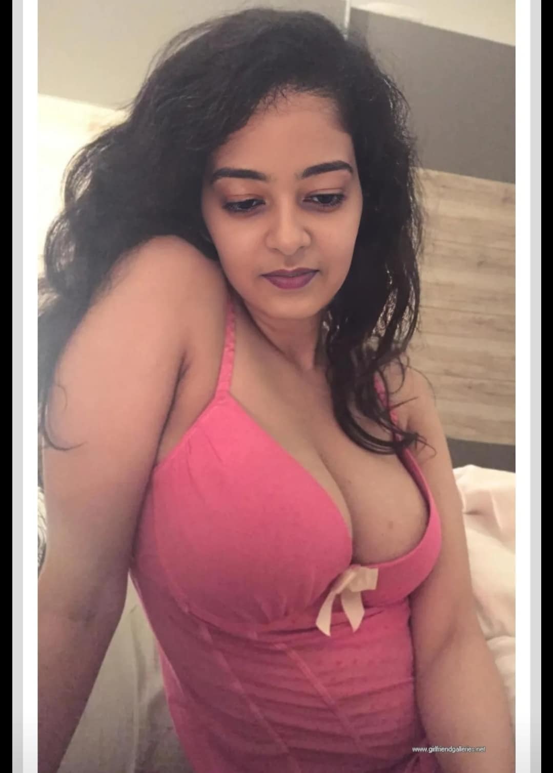 squatting upskirt pink - Bedroom Tease: Curvy South Asian Beauty in Pink Curvy South Asian woman in a tight pink top teases with prominent cleavage and sultry gaze in a bedroom setting. - Boobs Flash Pics