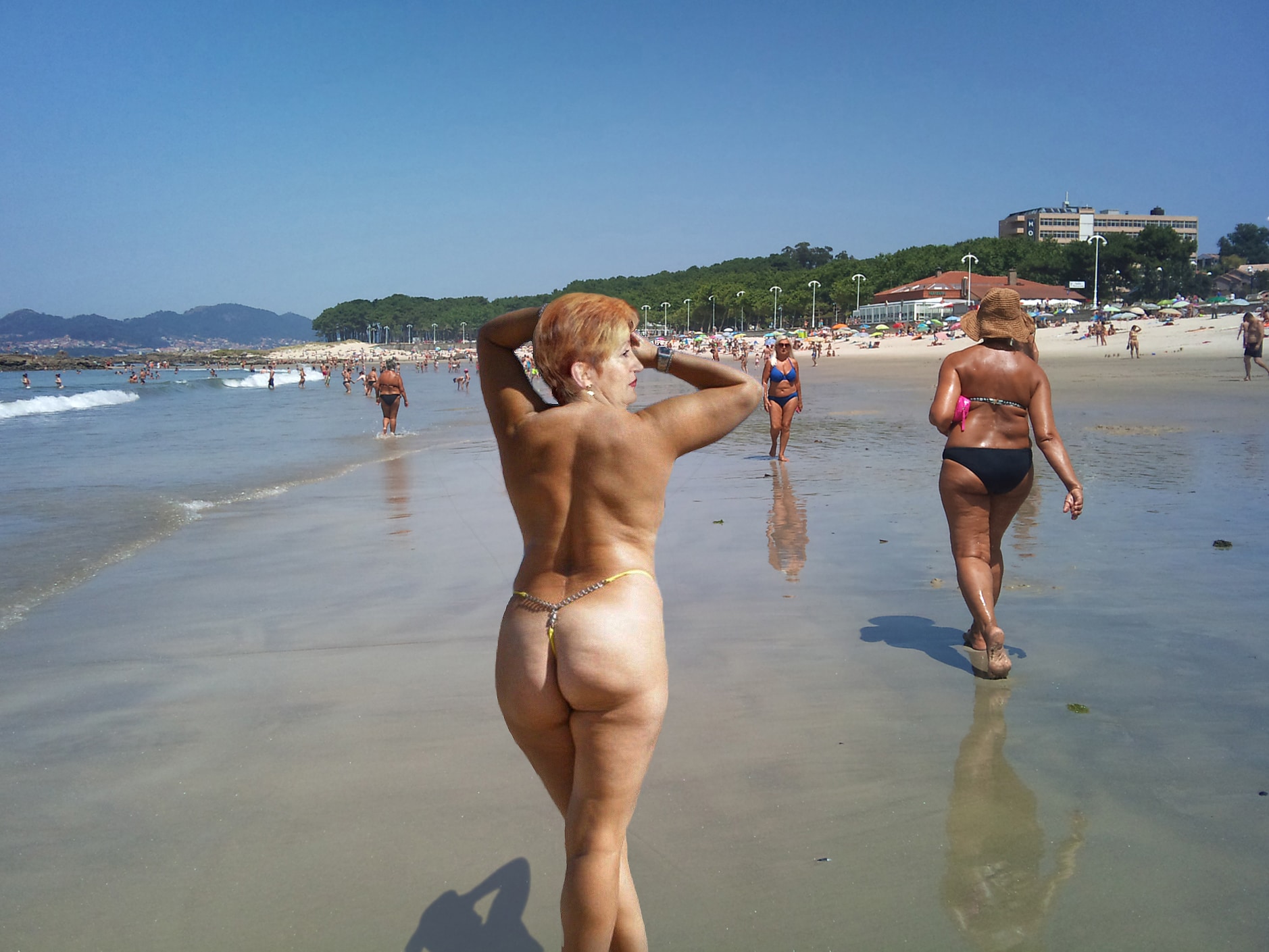 porn brack girl ass phot - Hotwife’s Beach Display: Ass Out, Eyes On A hotwife flaunts her ass in a yellow thong at Samil Beach, drawing attention with her confident pose and exposed body. Her companion, unaware, walks ahead i... - Ass Flash Pics